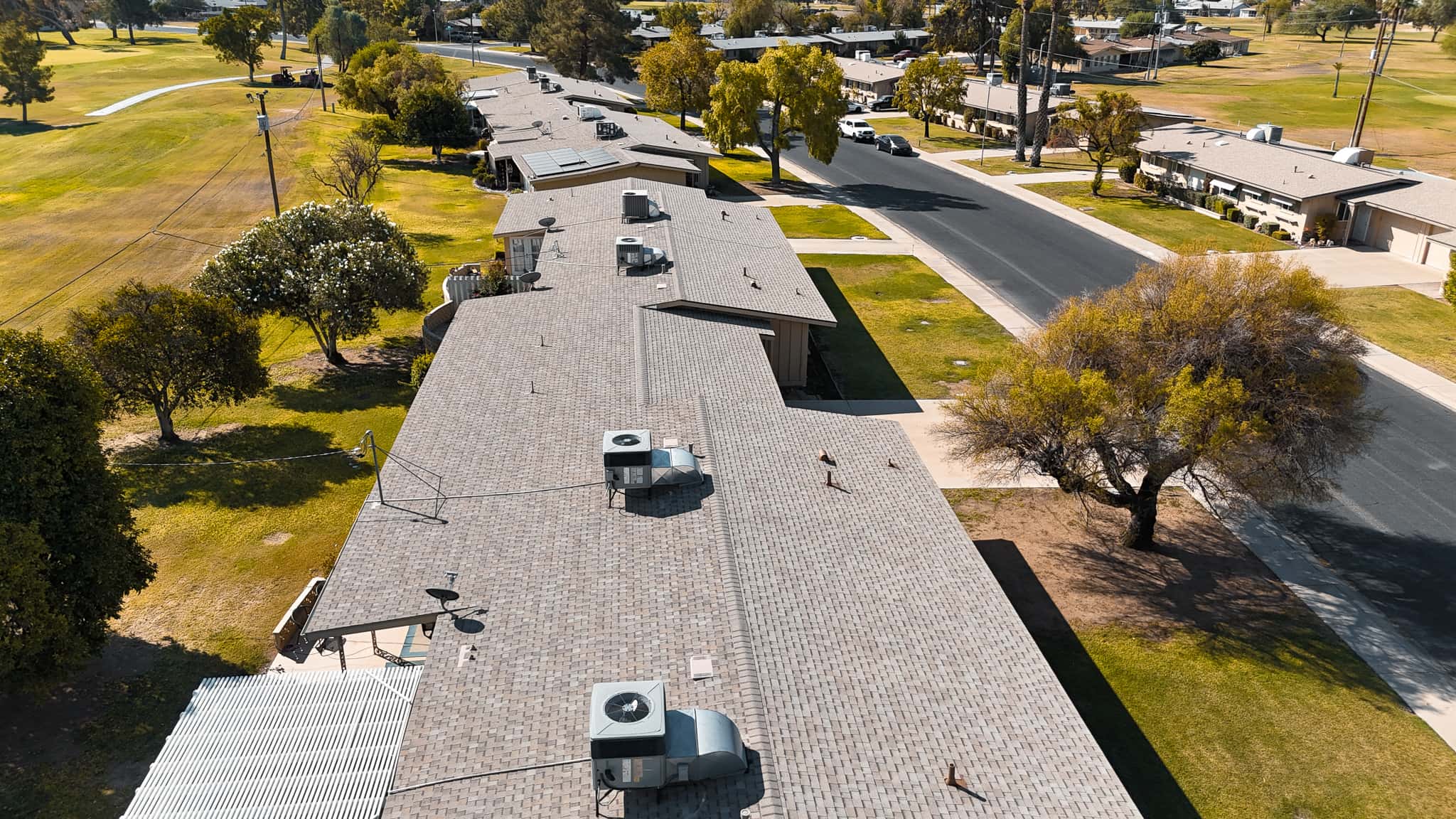 Aerial view of a completed HailCo Roofing shingle roof on a Phoenix Valley home in Scottsdale, Arizona